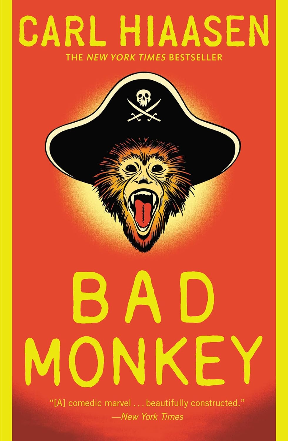 Book cover for "Bad Monkey" by Carl Ciaasen. Red background with yellow side margins and the illustrated head of an open mouthed monkey wearing a black tricorn hat with an emblem of a skull over a pair of crossed swords on the brim.