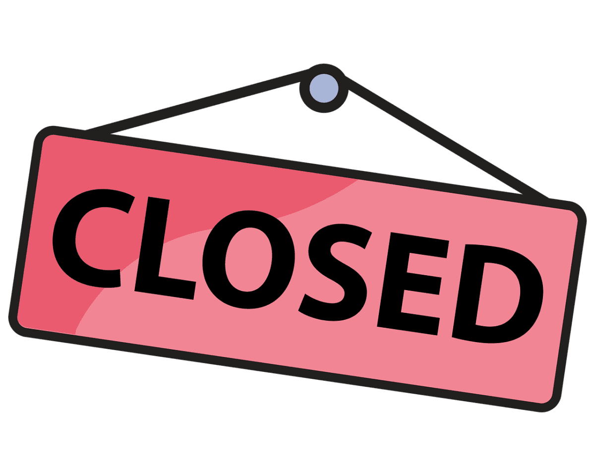 red sign that eards "Closed" in black letters hanging from a nail.