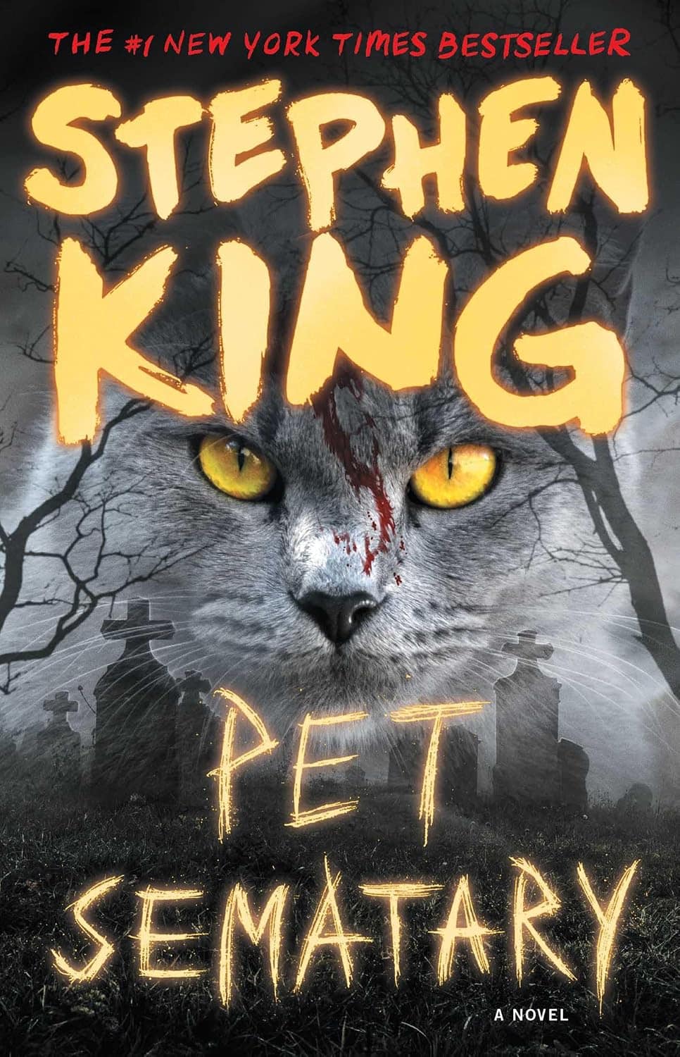 book cover image of Stephen King's "Pet Sematary" Grey cat with gld eyes with red blood flowing down its head.  Letters are gold tone.